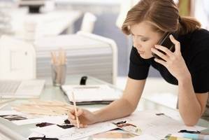 Image credit: <a href='https://www.123rf.com/photo_8784138_young-attractive-female-fashion-designer-working-at-office-desk-drawing-while-talking-on-mobile.html'>nyul / 123RF Stock Photo</a>