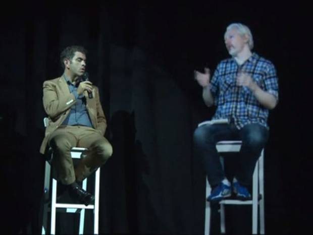 Julian Assange escapes incarceration to take part in conference as a hologram