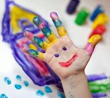 Little Children Hands doing Fingerpainting