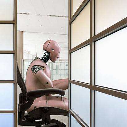 Robots will lead to increased productivity without stealing jobs, but wages will fall