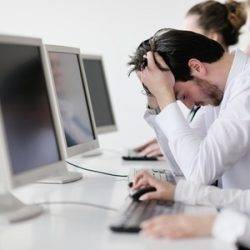 Majority Of Uk Workers Sit At Their Desk Between Four And Nine