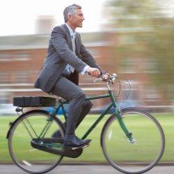 Man on a bike on his commute to work