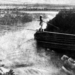 A woman crosses on a tightrope, illustrating the problem of uncertain work