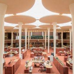 The Johnson Wax building designed by Frank Lloyd Wright was an early example of open plan office design