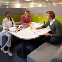 People in the sort of office design that encourages communication and better working relationships