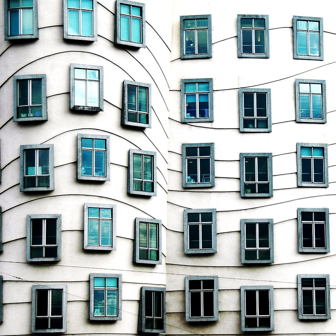 An image of the windows at the famous dancing house to illustrate the importance of ventilation and indoor air quality