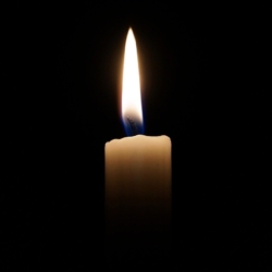 a lit candle to illustrate the idea of blackouts