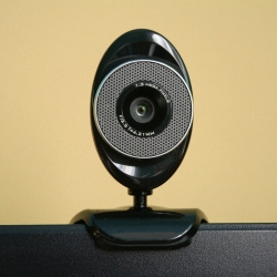 a webcam monitoring remote workers