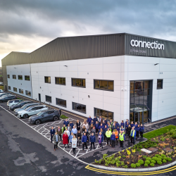 Staff gather outside the new Connection facility, a part of the Flokk Group